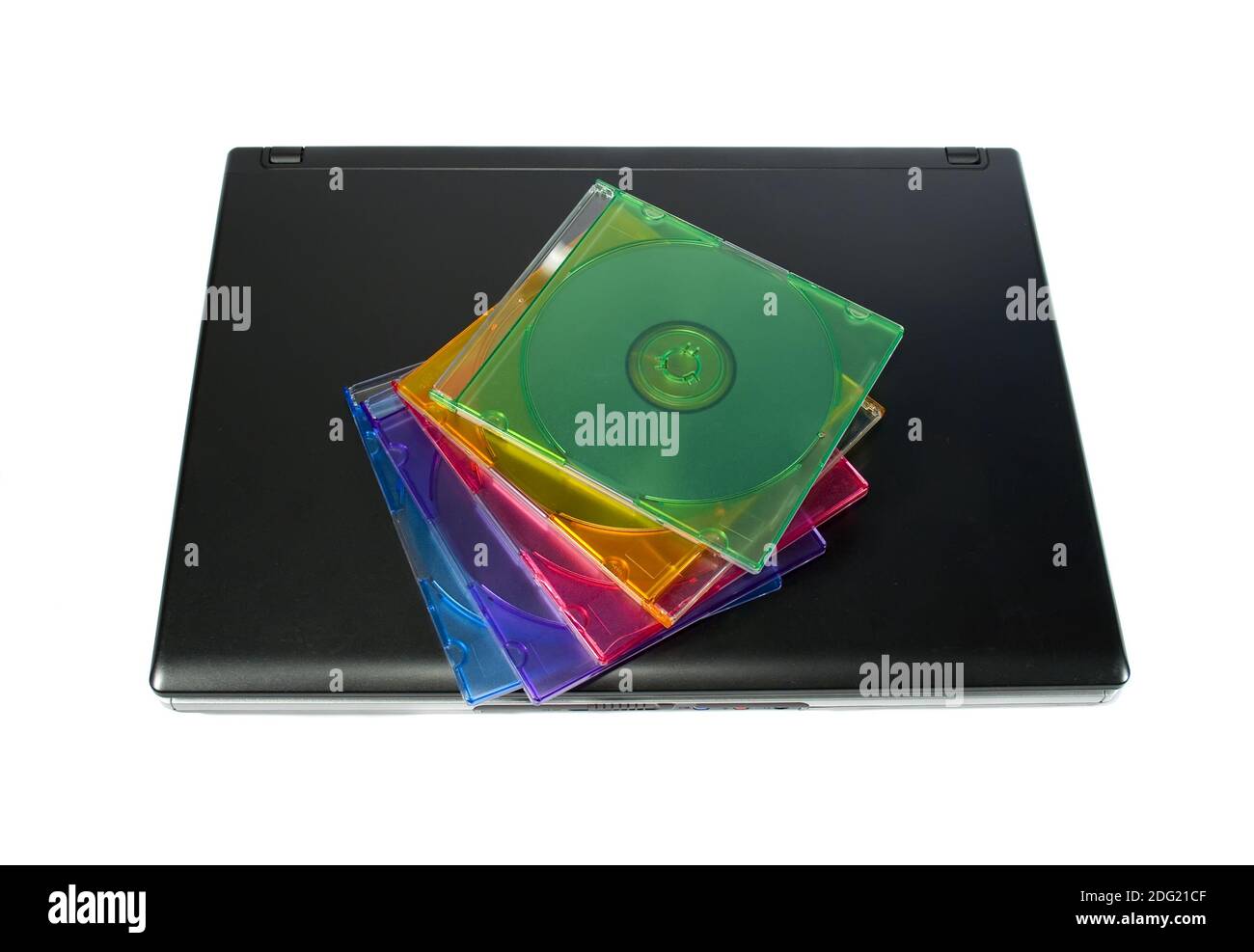 Colored cd`s on a laptop isolated Stock Photo